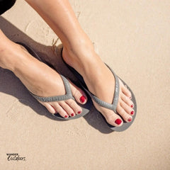 Archies Arch Support Thongs Grey Worn On Beach