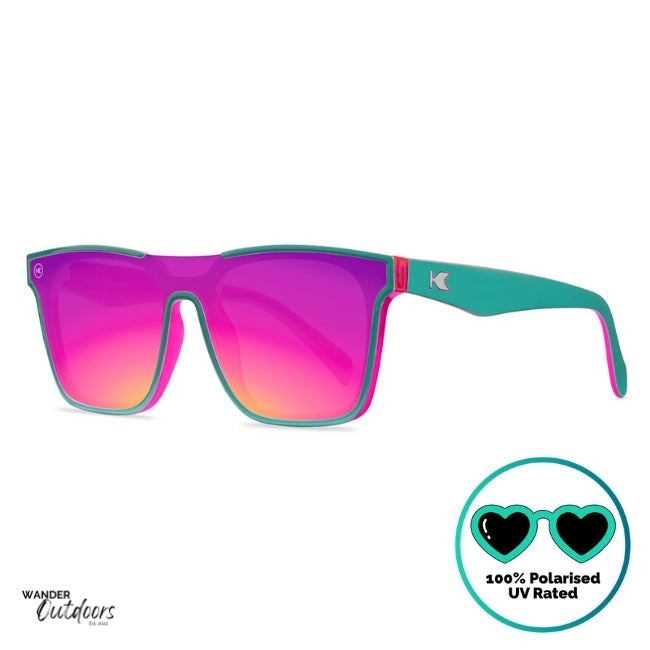 Knockaround Afters Miami Sunglasses with pink lenses and teal frames side view with K Logo.