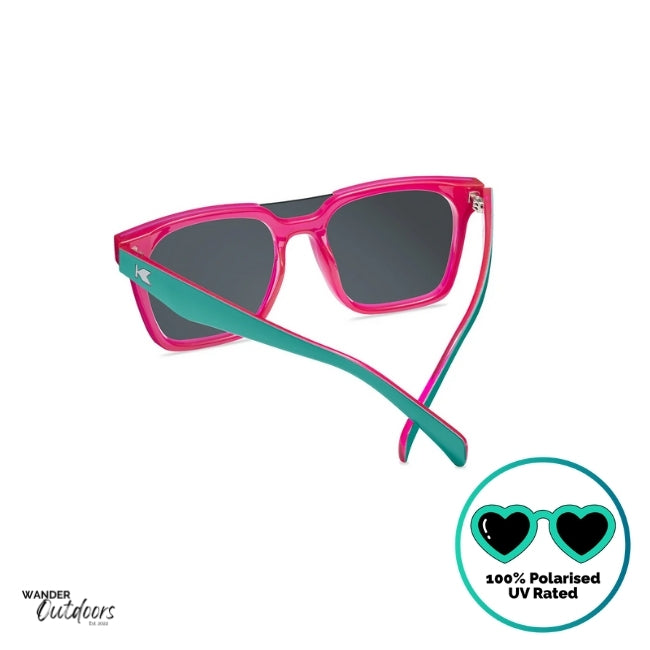 Knockaround Afters Miami Sunglasses with pink lenses and teal frames rear view, showing the inner frame colour.