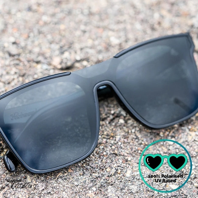 Knockaround Afters Piano Black Sunglasses with black lenses and black frames close up front view, unisex polarised and UV400 Rating.