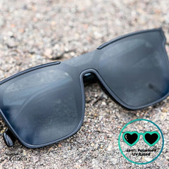 Knockaround Afters Piano Black Sunglasses with black lenses and black frames close up front view, unisex polarised and UV400 Rating.