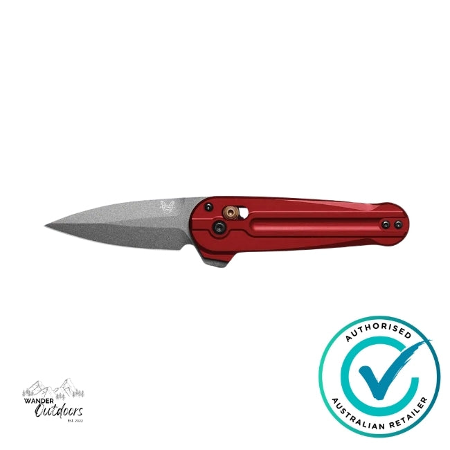 Benchmade 491GY-01 Lowden folding knife displayed flat with blade open, featuring red aluminium handle and grey Cerakote M390 blade.