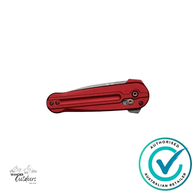 Benchmade 491GY-01 Lowden folding knife closed, highlighting compact design and red anodised aluminium handle.
