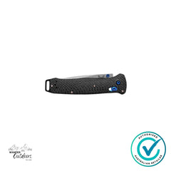 Benchmade 537-09 Bailout folding knife in closed position with carbon fibre scales and blue PVD hardware visible.