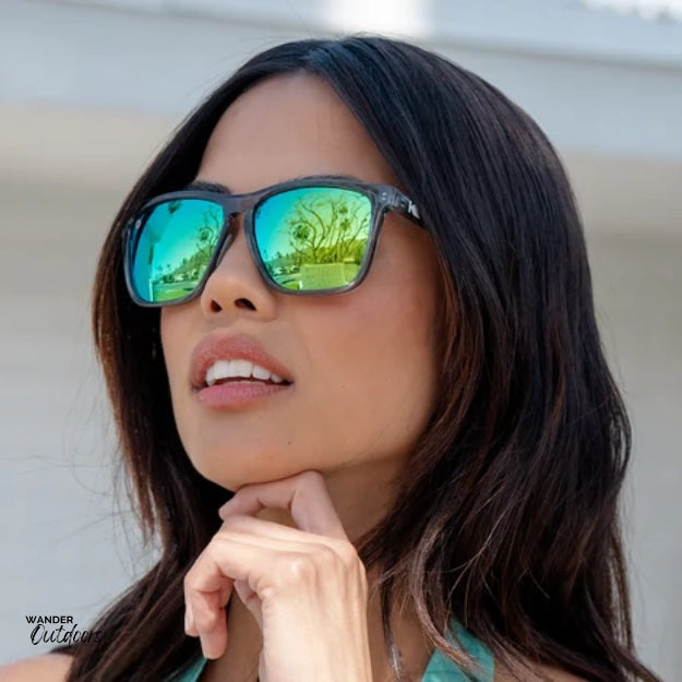 Unisex affordable Knockaround Fast Lanes Sport Sunglasses clear grey moonshine female wearing at park