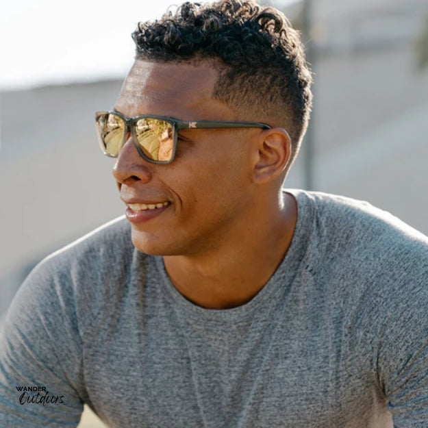 Unisex affordable Knockaround Fast Lanes Sport Sunglasses jelly grey peach male wearing on court