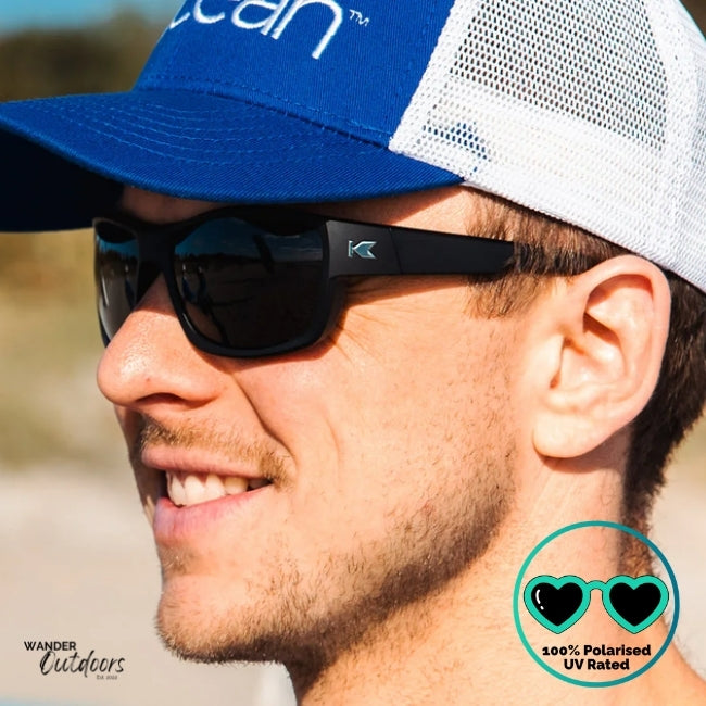 Knockaround High Stakes Blackout Sunglasses black frames and black salt water resistant lenses, unisex design fully polarised partial frontal side view of frame with K Logo., fishing.