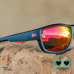 Knockaround High Stakes Inferno Sunglasses black frames and red salt water resistant lenses, unisex design close up of lens and frame.