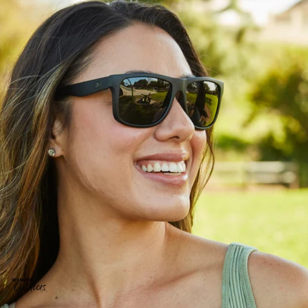Affordable Unisex Knockaround Torrey Pines Sport Sunglasses Black on Black woman in Park