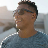 Affordable Unisex Knockaround Torrey Pines Sport Sunglasses Black on Black Man in Park