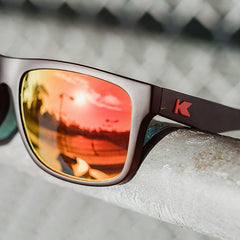 Affordable Unisex Knockaround Torrey Pines Sunglasses Matte Black Red Sunset Close Up