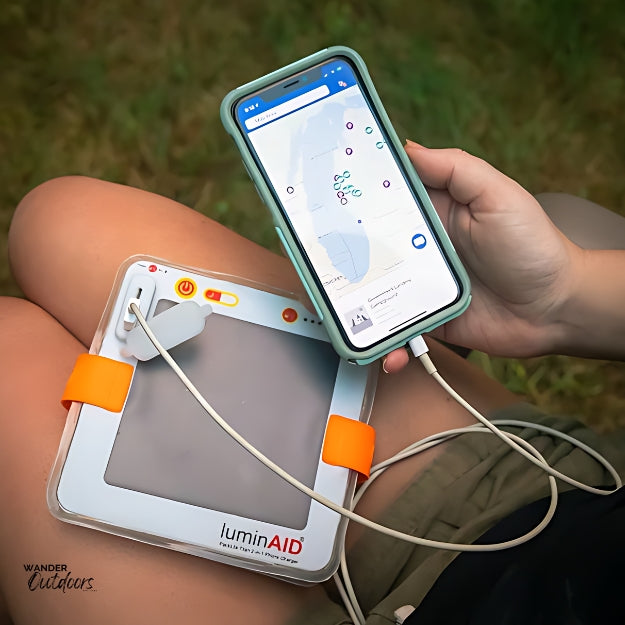 LuminAID PackLite Titan 2-in-1 Power Lantern charging smart phone