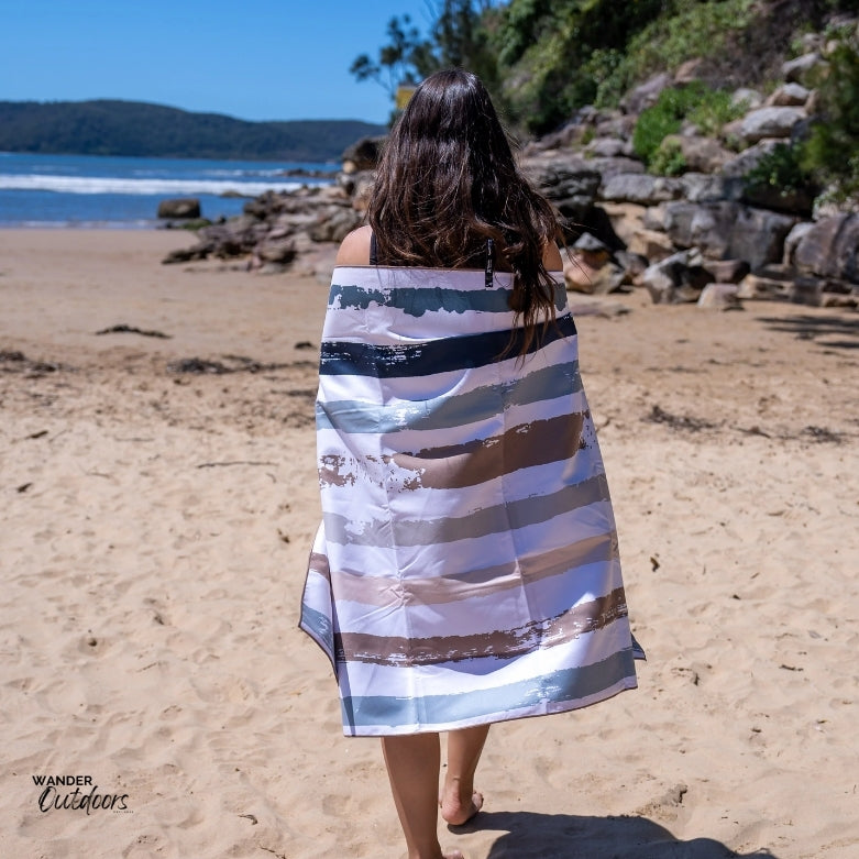 Newlyfe Beach Towel & Pouch Whitehaven on the beach