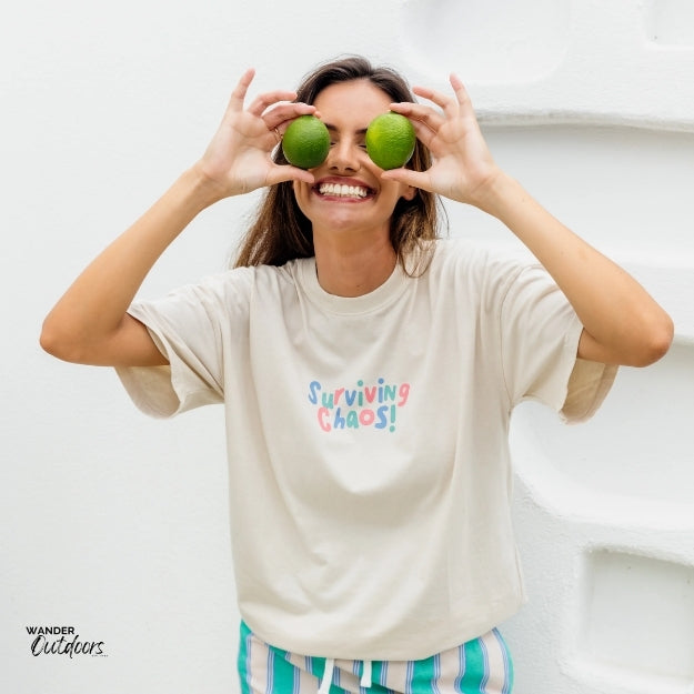 Lifestyle Shot – Surviving Chaos Tee in Action, Perfect for Busy Days
