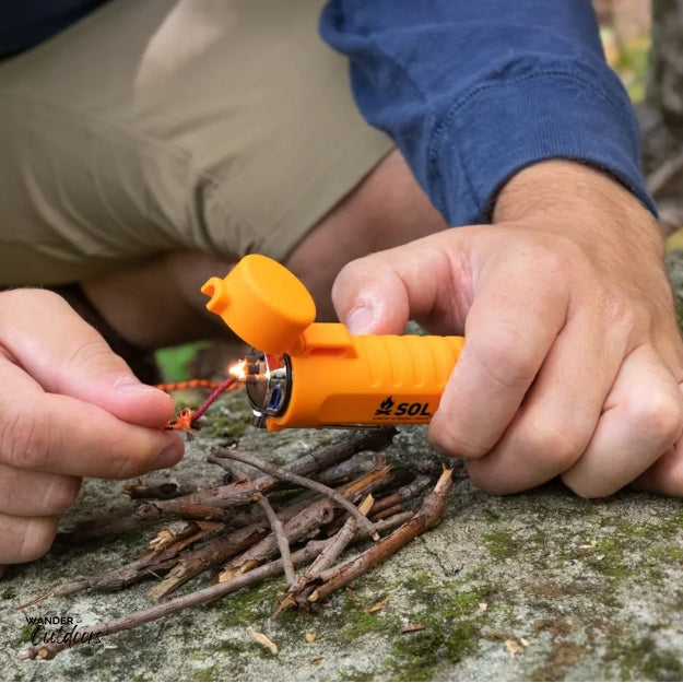 SOL Fire Liteβ’ Fuel-Free Lighter Lighting a camp fire