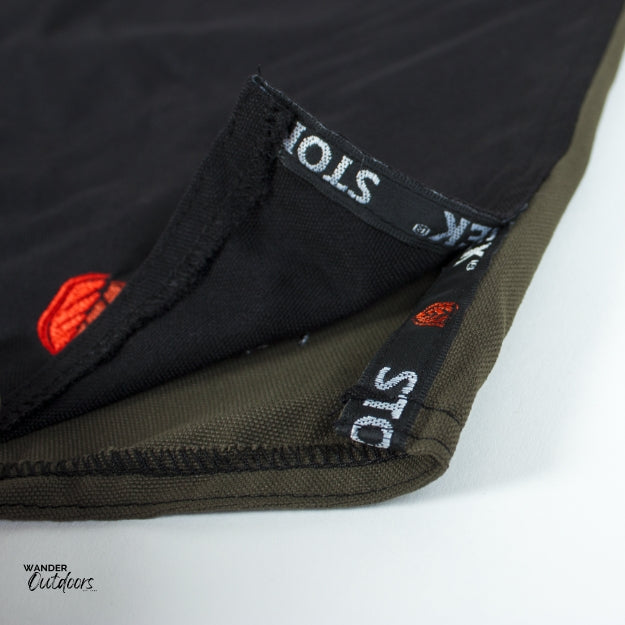 Stoney Creek Men's Jester Shorts in Bayleaf Black Close up of leg split