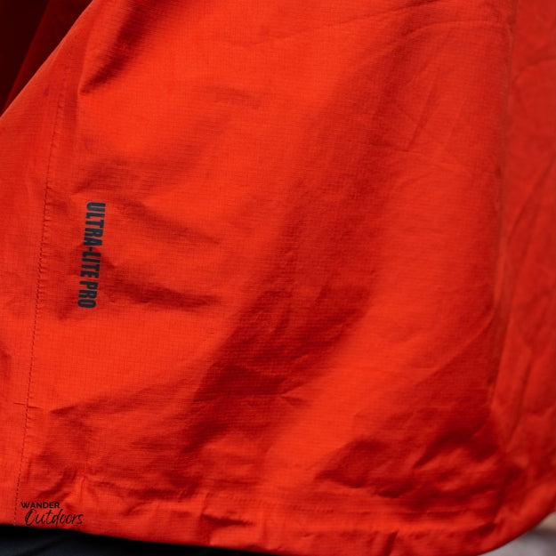 Stoney Creek Stow It Pro Jacket Ketchup Black Close Up of Drop tail