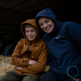 Kid & Mum wearing the roaster jacket on the farm.