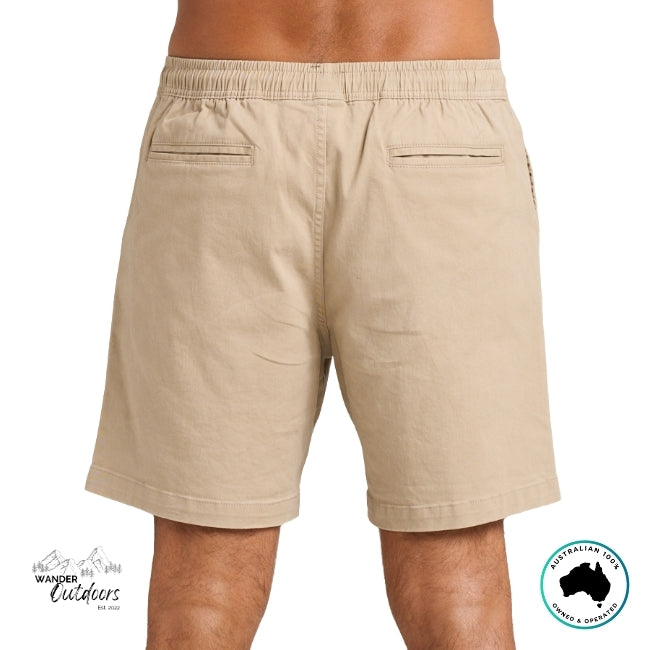 Taupe shorts worn by a person on a white background rear facing view