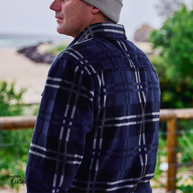 Model wearing The Mad Hueys FK OFF FISH ON Shacket, standing by the water