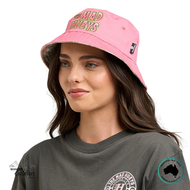 Woman wearing a pink cap and a grey shirt with The Mad Hueys Galah Anchor Logo on a white background