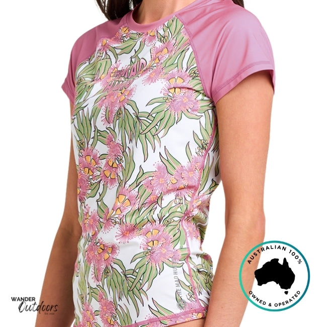 Floral-patterned shirt with pink sleeves on a white background, featuring the Wander Outdoors brand.