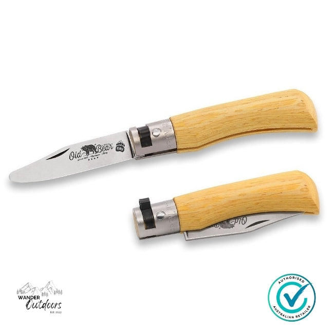 Two folding knives with wooden handles on a white background, featuring the 'Old Bear' brand.