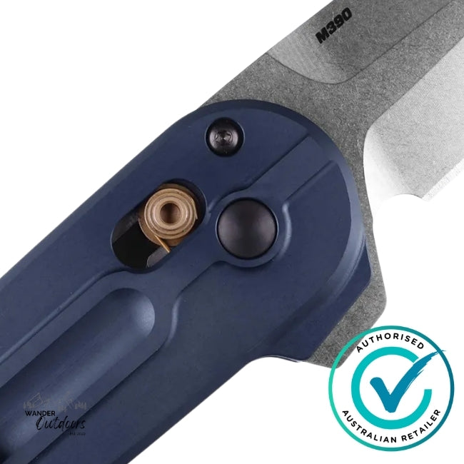 Close-up detail of Benchmade 491 Lowden Crater Blue handle and AXIS Lock system showing bronze pivot and M390 blade marking – authorised Australian retailer watermark.