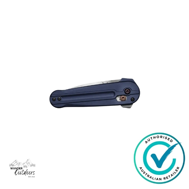 Benchmade 491 Lowden Crater Blue knife shown closed with smooth anodised handle and bronze hardware – Wander Outdoors authorised retailer mark visible.