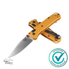 Orange folding knife with a visible brand logo on a white background