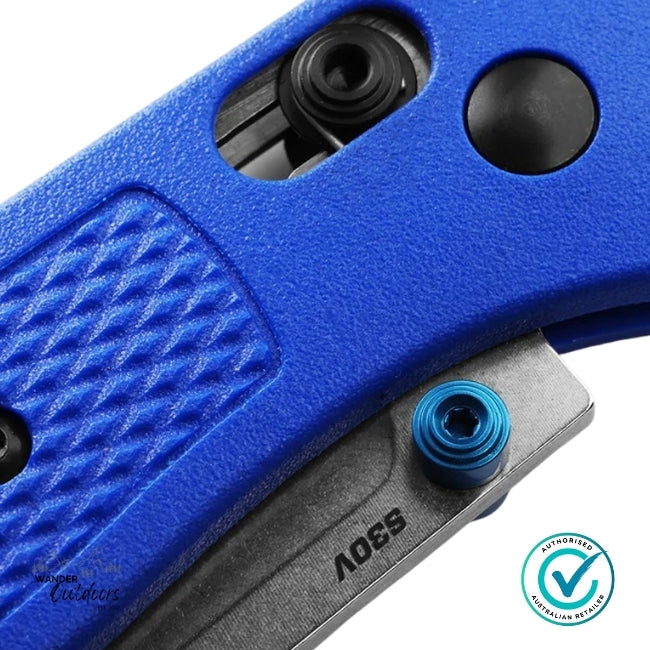 Close-up of a blue and gray pocket knife with visible branding.