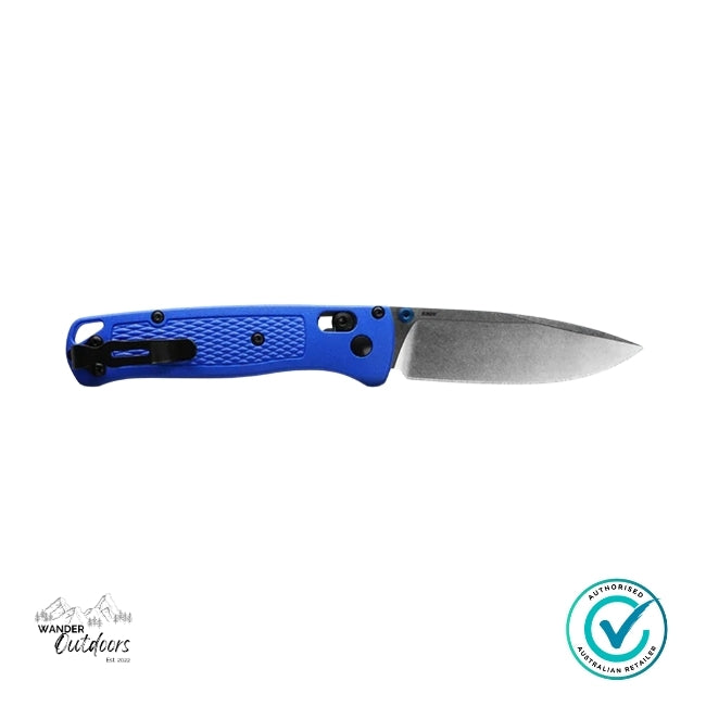 Folding knife with blue handle on a white background