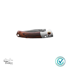 Folding knife with wooden handle and metal blade on a white background