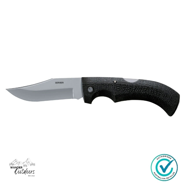 Folding knife with black handle and blade on a white background