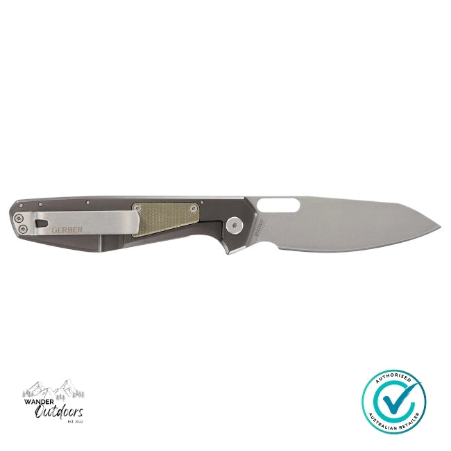 Folding knife with a silver blade and black handle on a white background, featuring the Gerber brand.