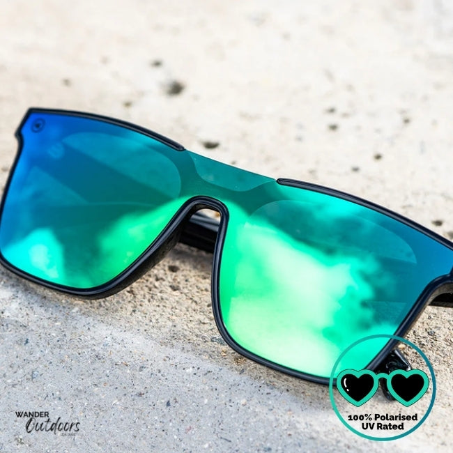 Knockaround Afters Ibiza Sunglasses with blue lenses and black  frames close up front view, unisex polarised and UV400 Rating. 