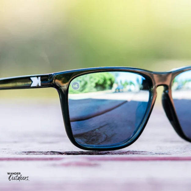 Unisex affordable Knockaround Fast Lanes Sport Sunglasses Jelly Black Sky Blue close up
