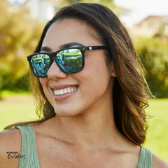 Unisex affordable Knockaround Fast Lanes Sport Sunglasses Jelly Black Sky Blue Female at park
