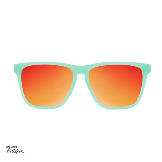 Unisex affordable Knockaround Fast Lanes Sport Sunglasses spearmint red sunset front on view