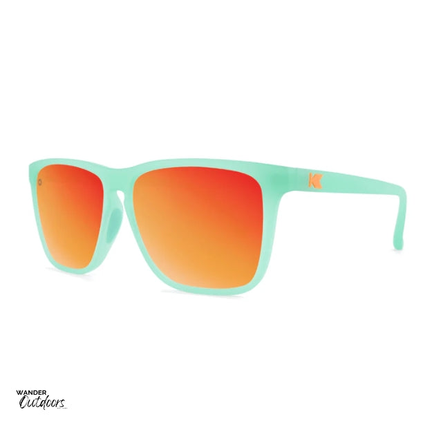 Unisex affordable Knockaround Fast Lanes Sport Sunglasses spearmint red sunset side view