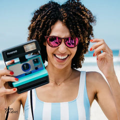 Knockaround Mai Tais Sunglasses Watermelon Geode Lady on Beach with Camera