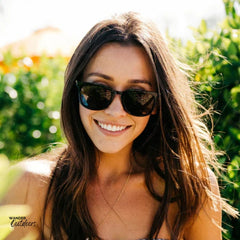 Knockaround Paso Robles Sunglasses Glossy Black Tortoise Shell Fade Lady in Park