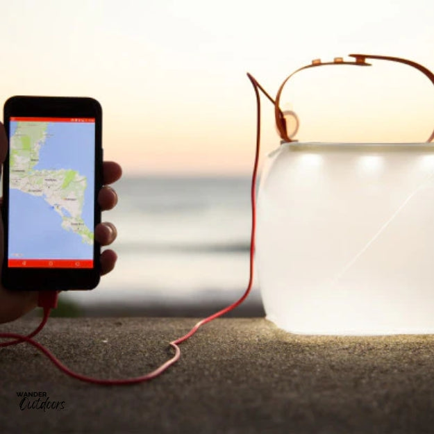 LuminAID PackLite Max 2-in-1 Power Lantern Charging Phone, Light on