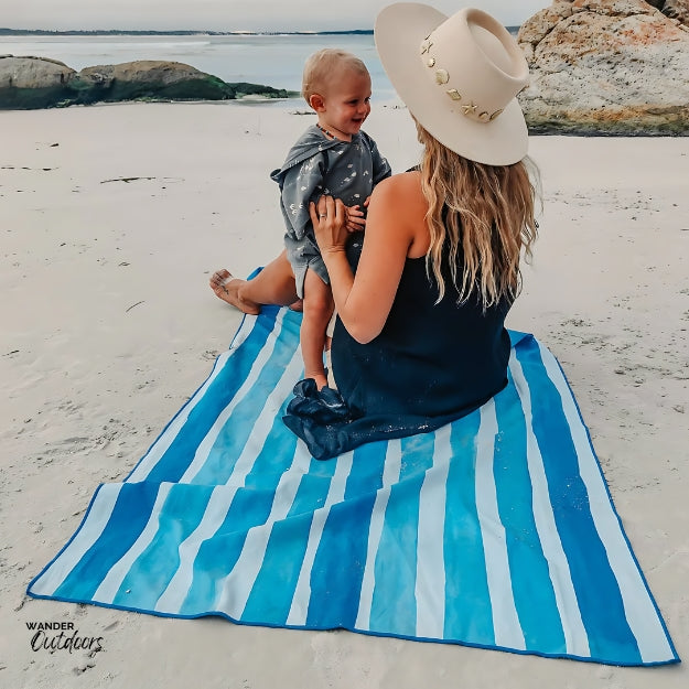 Newlyfe Beach Towel & Pouch Ocean Blue Mum and Baby on Beach