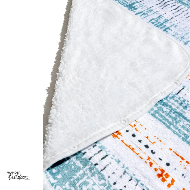 Newlyfe Wearable Fleece Blanket Orange Fleece close up with buttons showing