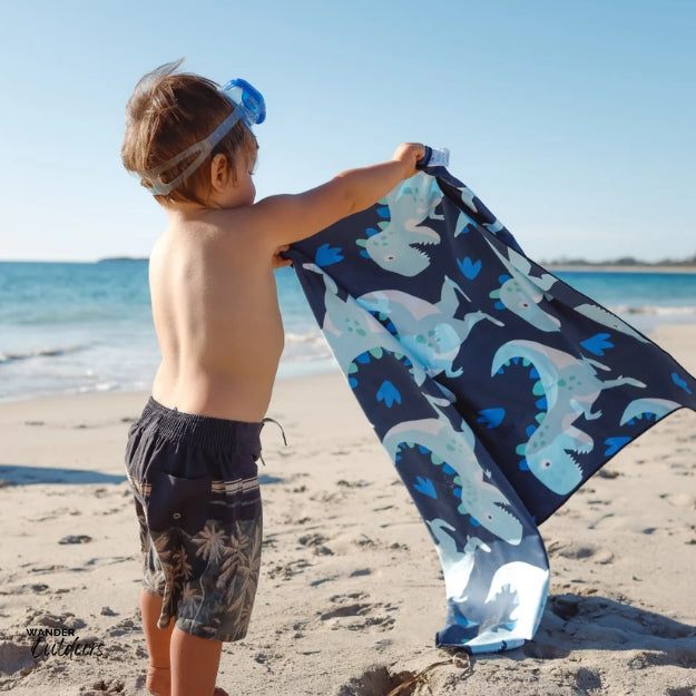 Newlyfe Kids Beach Towel Dinosaur Kid on beach