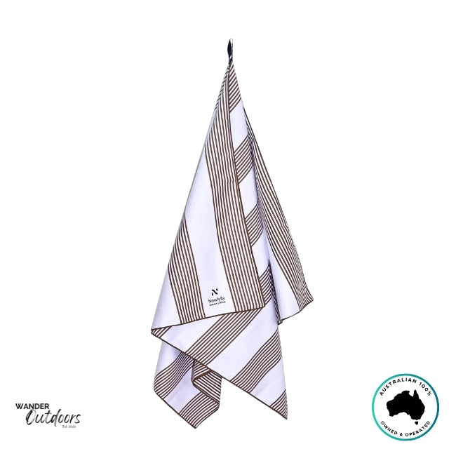 Newlyfe Signature Piha Brown Sand-Free Beach Towel with matching pouch in earthy brown and white stripes.