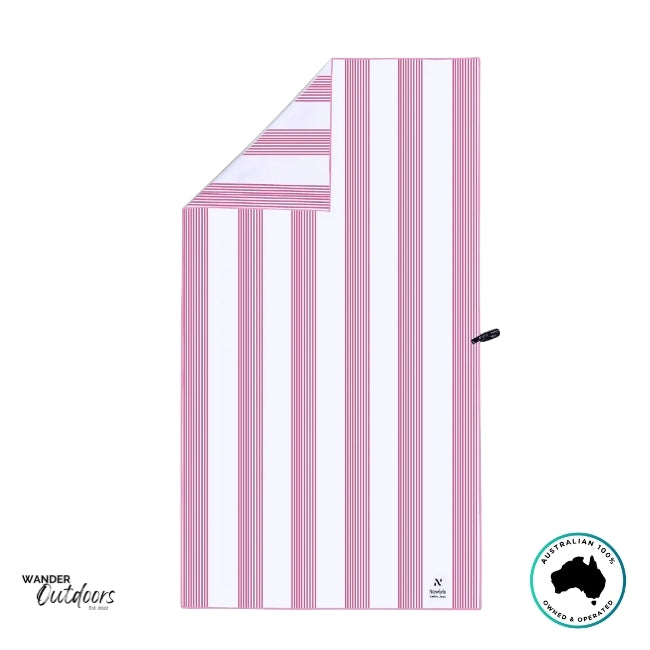Flat-lay of Newlyfe Signature Sanur Pink Towel with crisp pink and white stripe design.