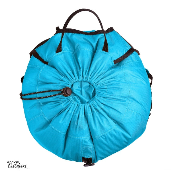 LiteSåk Pak | Ultralight Packable Waterproof Backpack in blue, rolled down and secured. 
