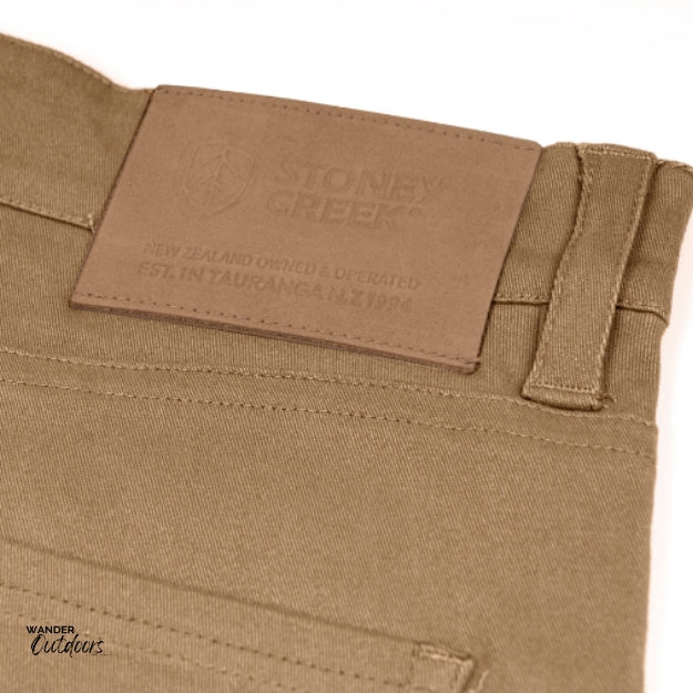 Stoney Creek Men's Urban Trousers in Tobacco leather logo close up